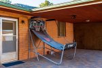 Basketball hoop outdoors for the kids to challenge the adults in